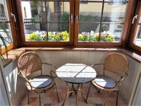 verglaster Balkon in dem Sie auch bei Regen gemütliche Stunden verbringen können - Bild 1: Ferienwohnung Bad Schandau für 2 Personen